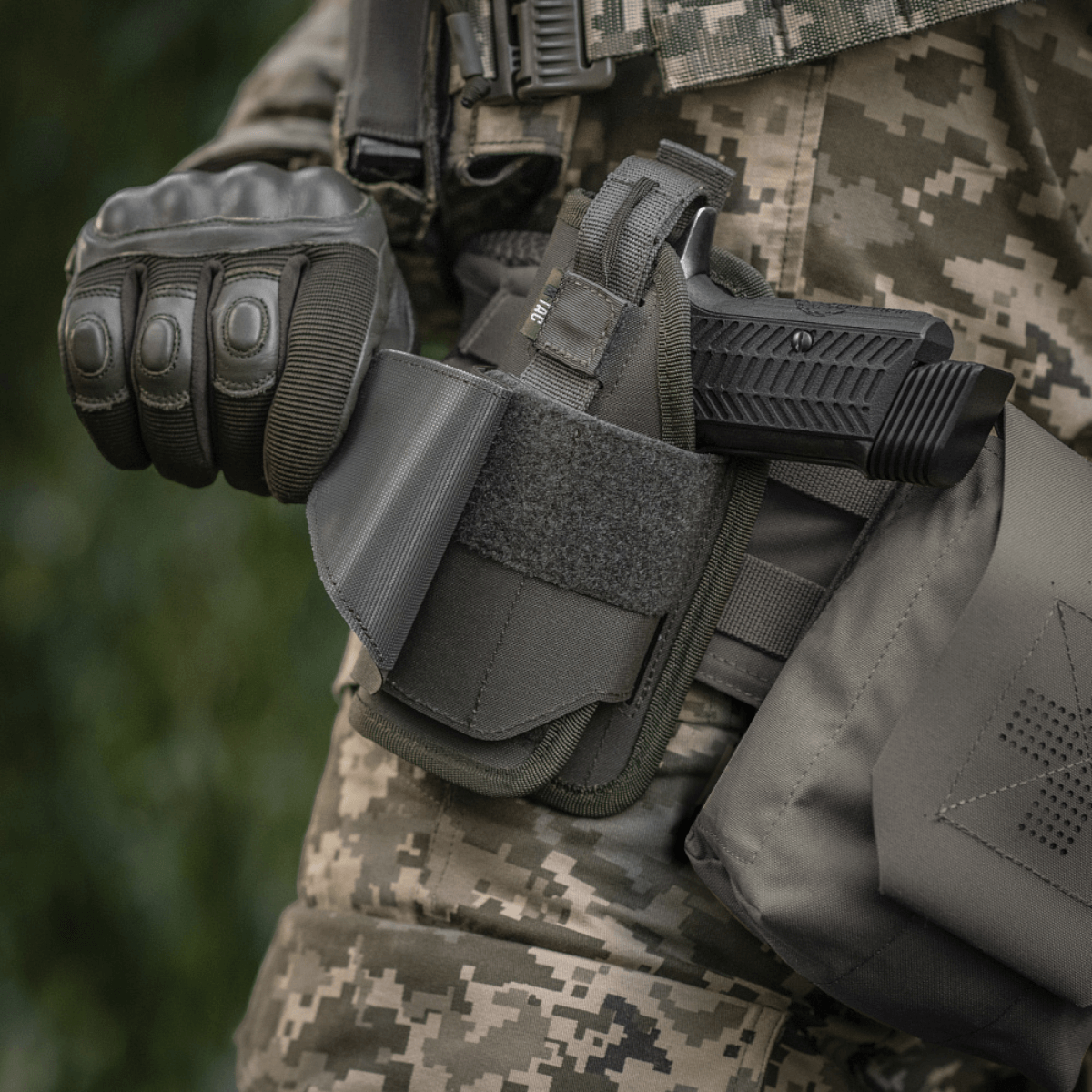M-Tac Universal taktinen kotelo Elite vasen laminoitu Cordura 500D, säädettävä istuvuus, NIJ-sertifiointi, galleria-asento 1.