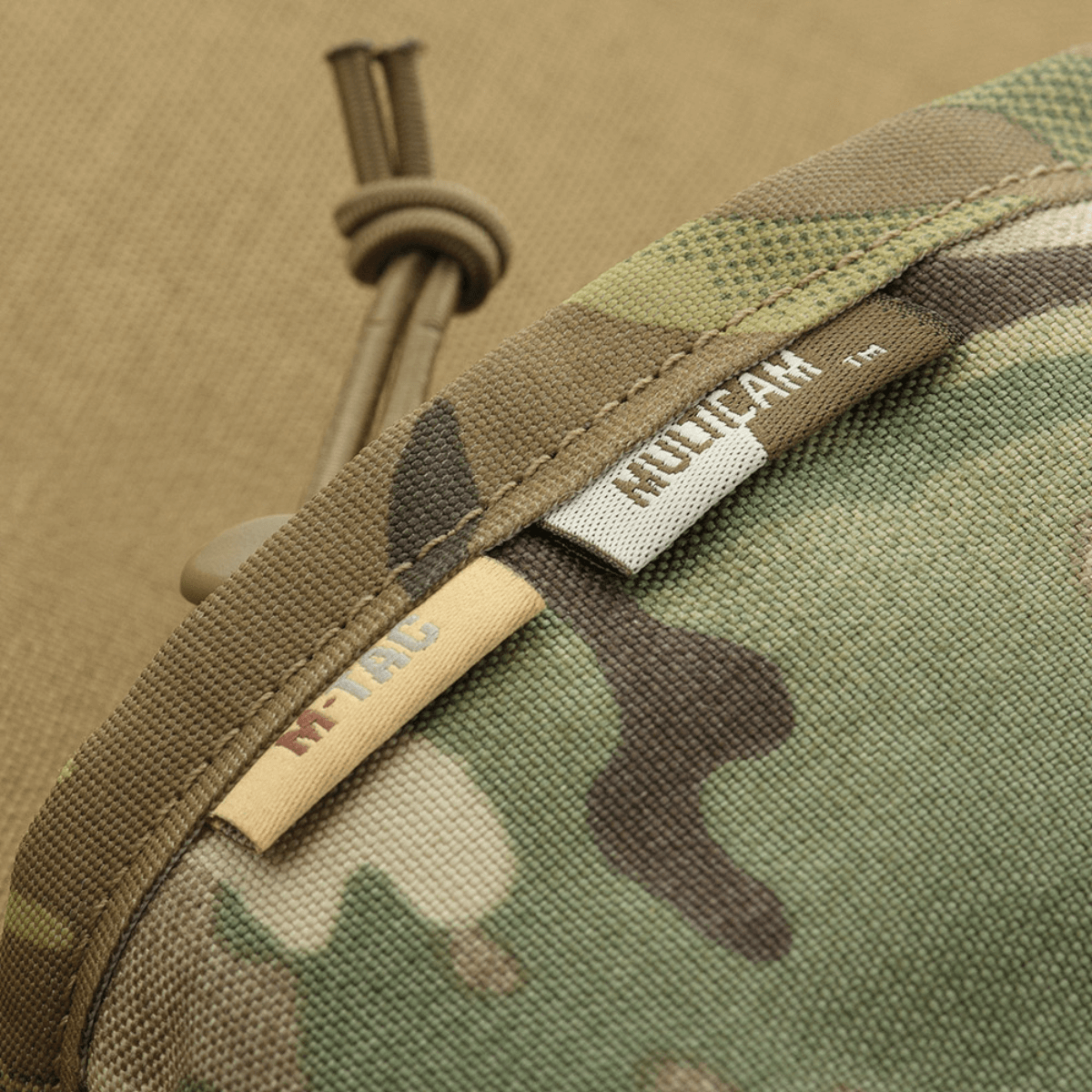M-Tac taktinen käsilämmitin Elite kestävästä Cordura 500D -materiaalista ja pehmeällä mesh-takapuolella mukavuutta ja tuuletusta varten.