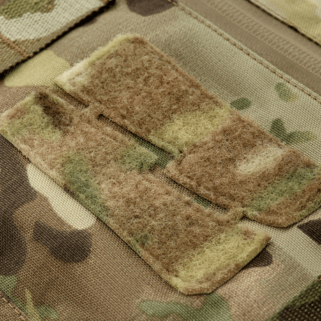 Lähikuva M-Tac taktinen käsilämmitin Elite kestävä Cordura 500D camokuvioinnilla kylmään säähän.