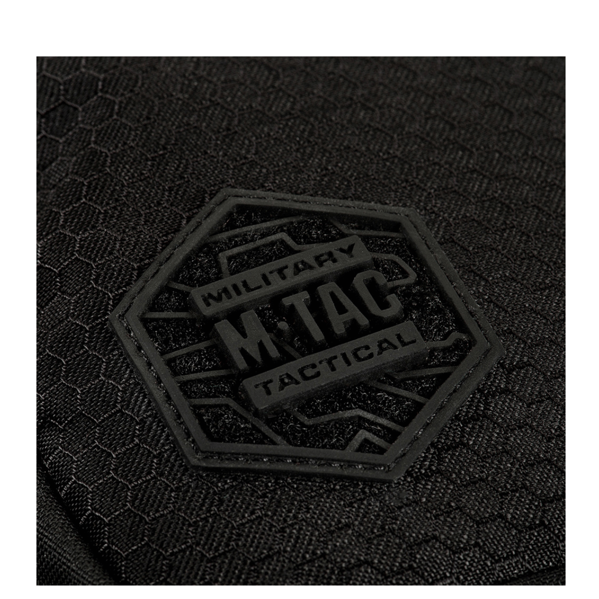 M-Tac Sling Pistoltaske Elite Hex Cordura-materiaalista ja M.Tac-logo laukun pinnalla.