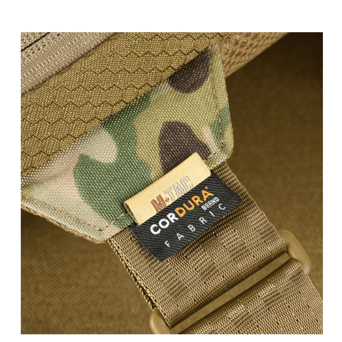 Materiaaliyksityiskohta M-Tac Sling Pistoltaske Elite Hexistä Cordura-kankaalla ja säädettävällä hihnalla.