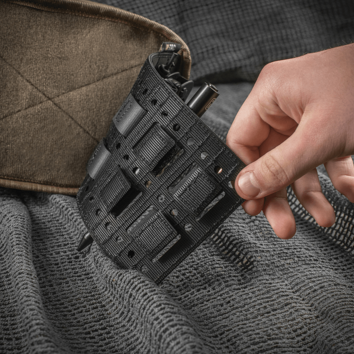 M-Tac Modul Insert Molle 11x19, Laser Cut helpottaa laukun organisointia. Polymerkomposit, kestävä ja pitkäikäinen, MOLLE-yhteensopivat lokeroiset.