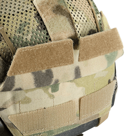 M‑Tac Hjelmcover Shroud Elite MULTICAM-maastokuvio, suunniteltu TOR-D-kypärille, Velcro-paneelit ja remmit lisänaamiointia varten.
