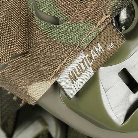 M‑Tac Vilha Hjelmcover FAST Multicam, valmistettu kulutusta kestävästä Cordura 500D:stä, suunniteltu kypärän naamiointiin ja suojaukseen.