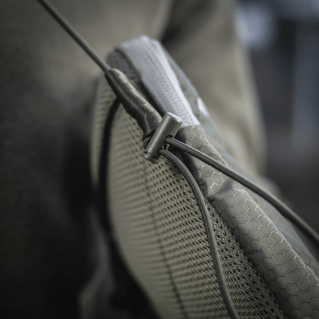 M‑Tac Pocket Bag Elite HEX kestävästä materiaalista ja kestävillä YKK-vetoketjuilla, ihanteellinen päivittäiseen käyttöön ja EDC-varusteiden säilytykseen.