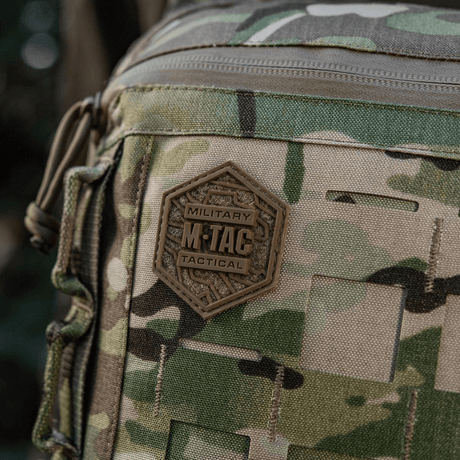 M-Tac Tablet Bag Laser Cut Hex Cordura, Laser Cut MOLLE, sisältää YKK- ja Woojin-komponentit.