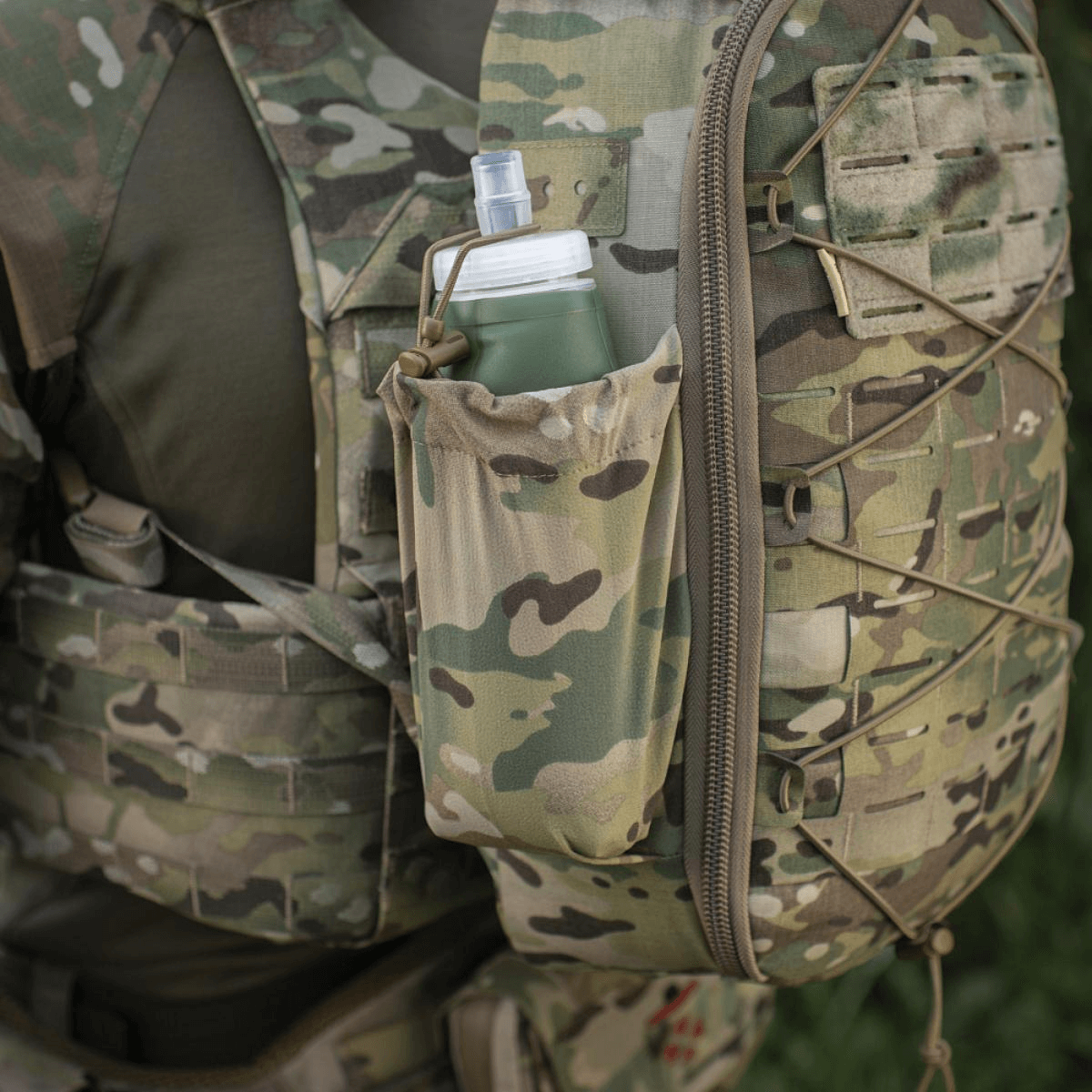 M-Tac STURM Elite -reppu joustavalla sivutaskulla ja camo-muotoilulla, sopiva lyhytaikaisiin tehtäviin. Taktinen reppu välttämättömille varusteille.