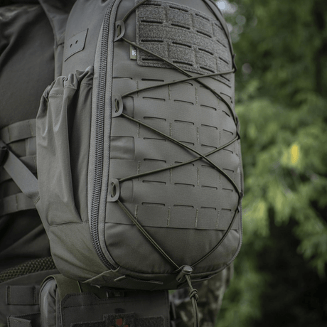 M-Tac STURM Elite -reppu MOLLE Laser Cut -etupaneelilla, joustavat sivutaskut ja vahva Cordura-materiaali.