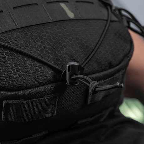 M-Tac STURM Elite -reppu taktisen MOLLE Laser Cut -etupaneelin kanssa ja kestävä Cordura-rakenne lyhyille kenttäretkille.