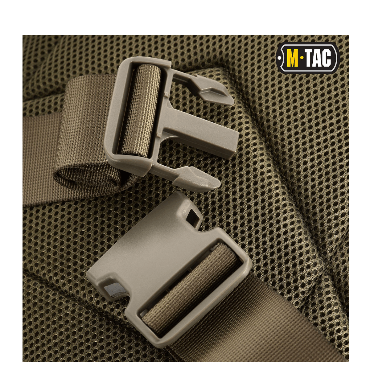 Yksityiskohta M-Tac Large Assault Pack -repun soljesta ja hihnajärjestelmästä.