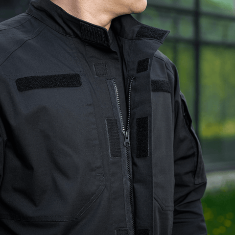 M-Tac Patrol Flex -takki Velcro-yksityiskohdilla ja korkealaatuisella vetoketjulla, suunniteltu taktiseen käyttöön. Musta takki ID-paneeleilla