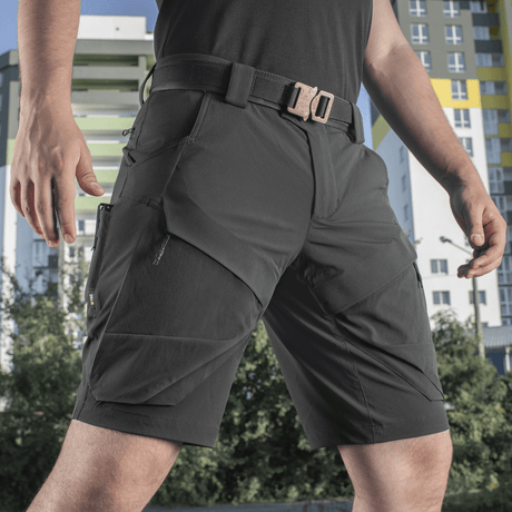 M-Tac Shorts Rubicon Flex - tummanvihreät cargoshortsit käytännöllisillä taskuilla ja 4-Way Stretch, ihanteelliset kesäkäyttöön.