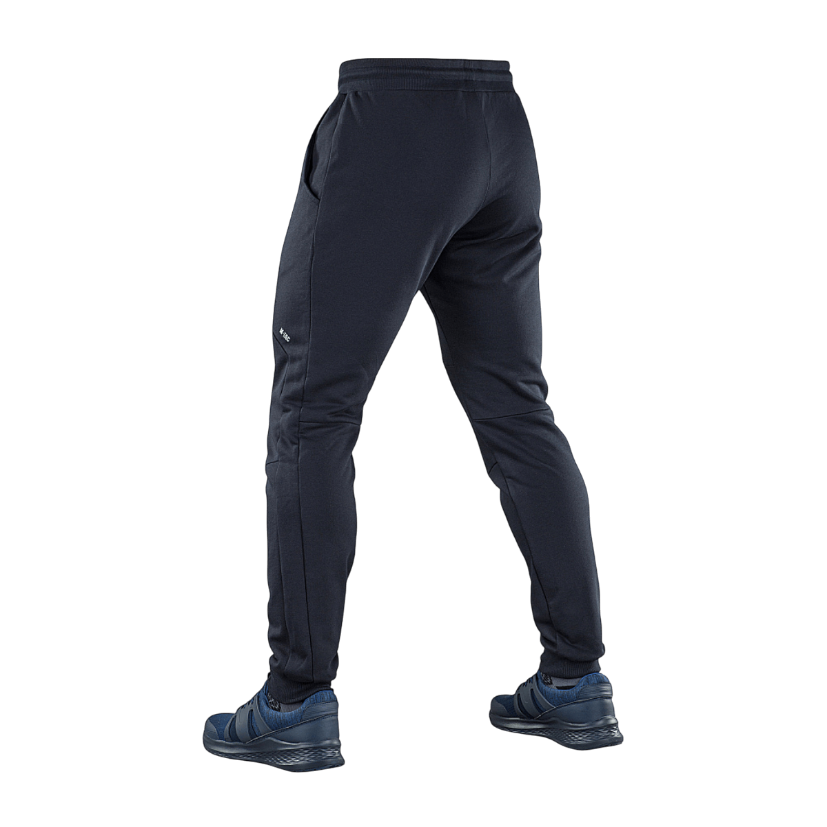M-Tac Stealth Cotton -housujen takaosa, monikäyttöiset mustat urheiluhousut kuminauhalla vyötäröllä ja sivutaskuilla, 100% puuvillaa.