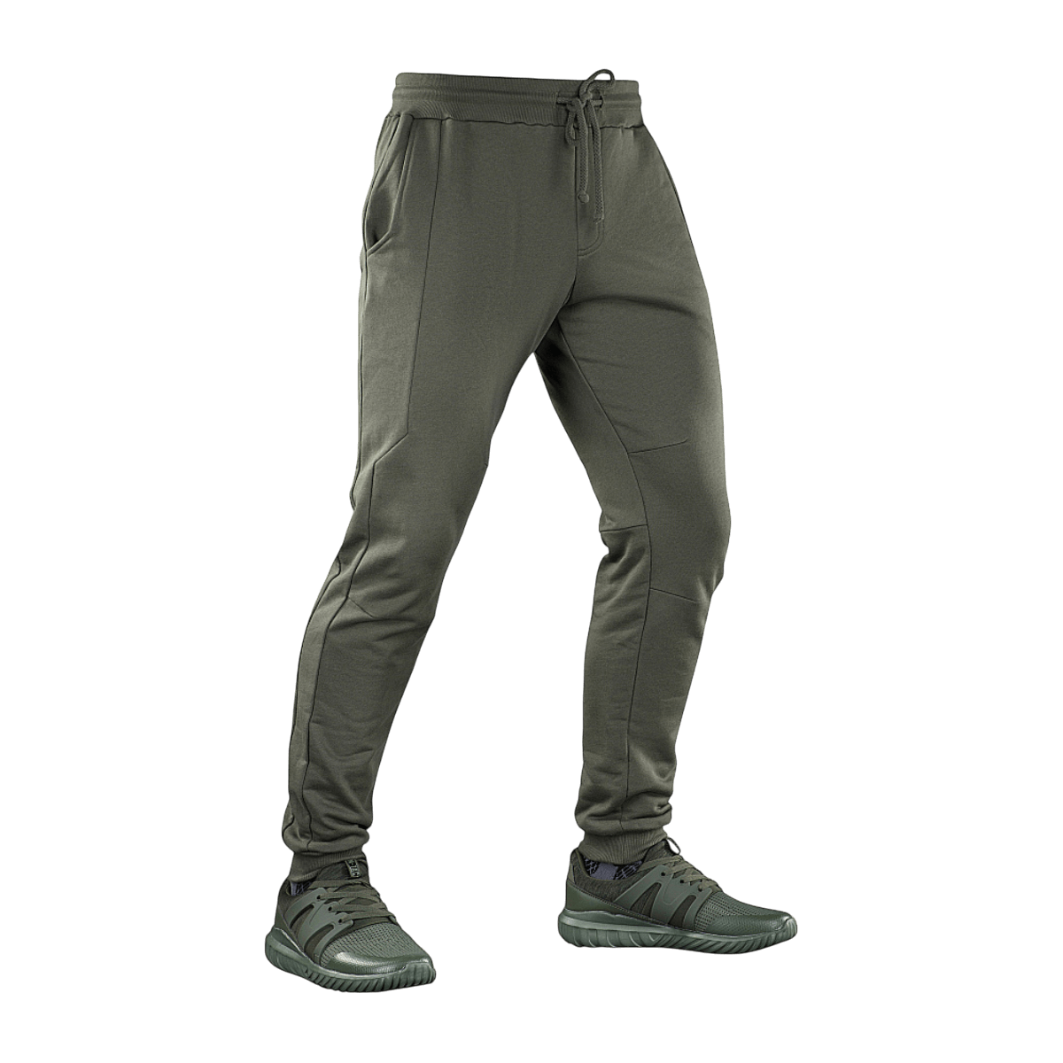 M-Tac Stealth Cotton -housut oliivinvihreänä, kaksi sivutaskua ja kuminauha, suunniteltu mukavuuteen ja liikkumisvapauteen urheilun aikana.