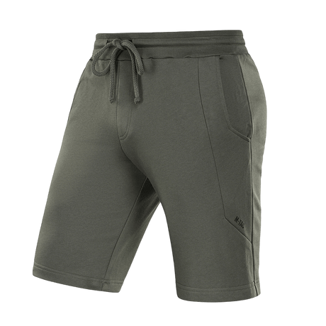 M-Tac Shorts Casual Fit Cotton vihreänä, kuminauhavyötäröllä, kahdella sivutaskulla ja hillityllä logolla mukavaan kesäkäyttöön.