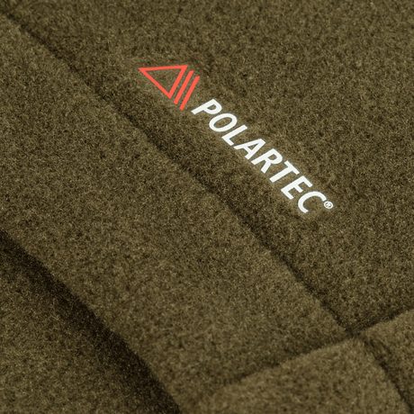 M-Tac Nord Polartec -fleecetakin lähikuva Polartec®-logolla. Premium-luokan lämmöneristys ja kosteudenhallinta arkeen.
