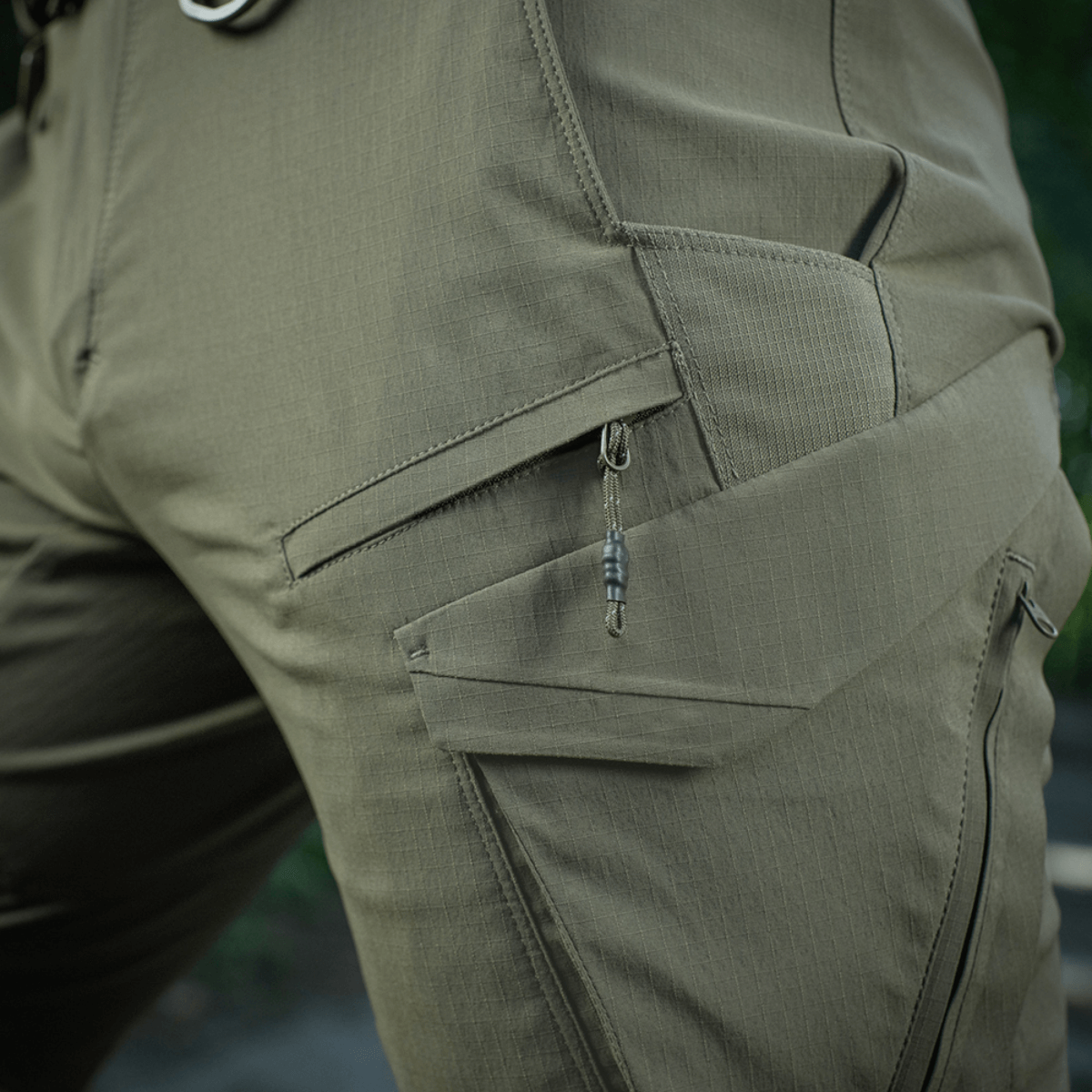 M-Tac Aggressor Summer Flex Shorts, käytännölliset taskut ja Flex Rip-Stop -kangas, täydelliset ulkoiluun ja taktiseen käyttöön.