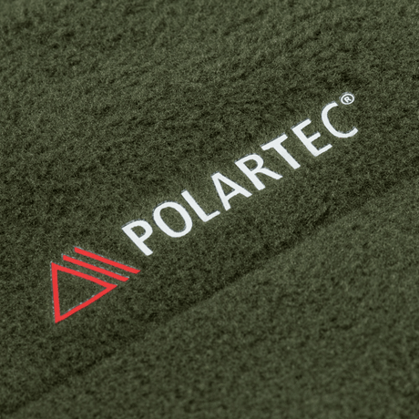 M-Tac Combat Fleece Polartec -takki Polartec-logolla oliivinvihreässä kankaassa. Soveltuu taktiseen ja arkipukeutumiseen. Polyesteri.