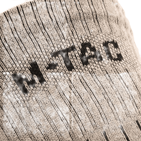 M-Tac Sokker Mk.1 -sukat, suunniteltu mukavuutta ja tukea varten pehmusteilla ja tuuletuskanavilla, ihanteellinen vaativiin aktiviteetteihin.