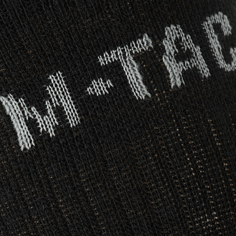 Lähikuva M-Tac Sokker Winter Wool -sukista, yksityiskohtainen neulos merinovillalla lämmöksi ja mukavuudeksi talvikaudella.