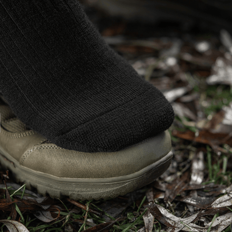 M-Tac Sokker Winter Wool talvisaappaan kanssa käytettynä, sopii kylmiin olosuhteisiin. Merinovilla tarjoaa lämpöä ja mukavuutta, liukumaton.