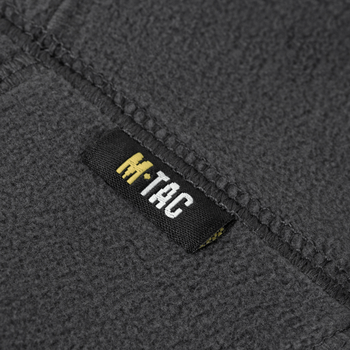 M-Tac Polartec Anatomic Tube Scarf -tuotetarra, valmistettu Polartec® Micro Series -fleecestä. Fleecemateriaali on harmaa ja kestävä.