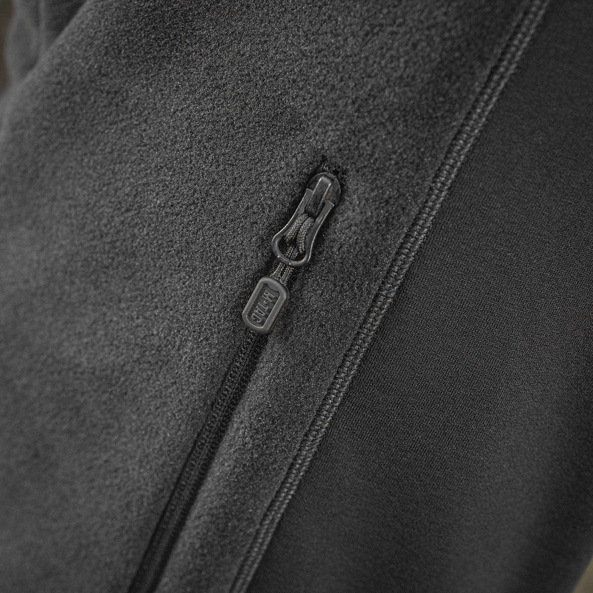 M-Tac Polartec Sport -fleecatakki, korostus vetoketjudetaljeissa ja Polartec® 200 Series -fleecessä.