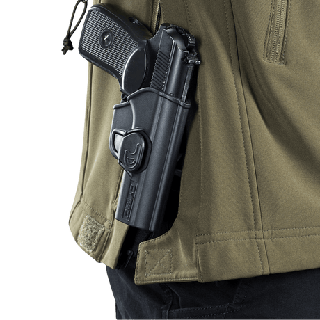 M-Tac Soft Shell Police Jakke sivunäkymä, piilotetun pistoolikotelon kanssa, toiminnallinen muotoilu sääsuojaukseen ja liikkumavapauteen.