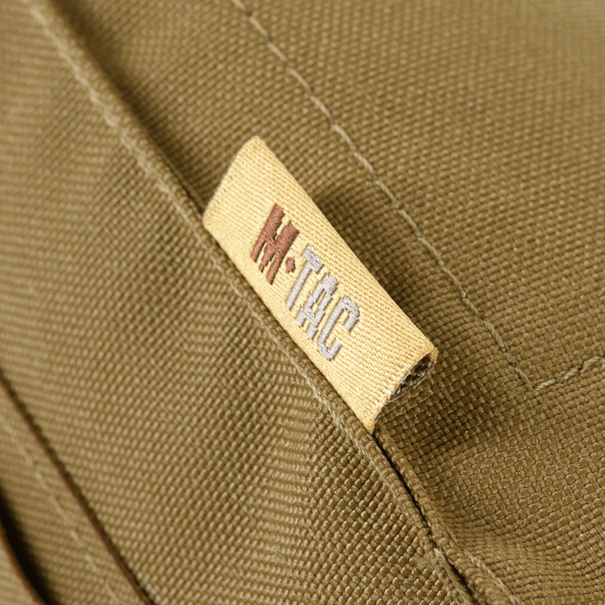 M-Tac M249 Cartridge Box Closed -tasku, yksityiskohta M-Tac-logolla Cordura 500D -materiaalissa, ruskea.