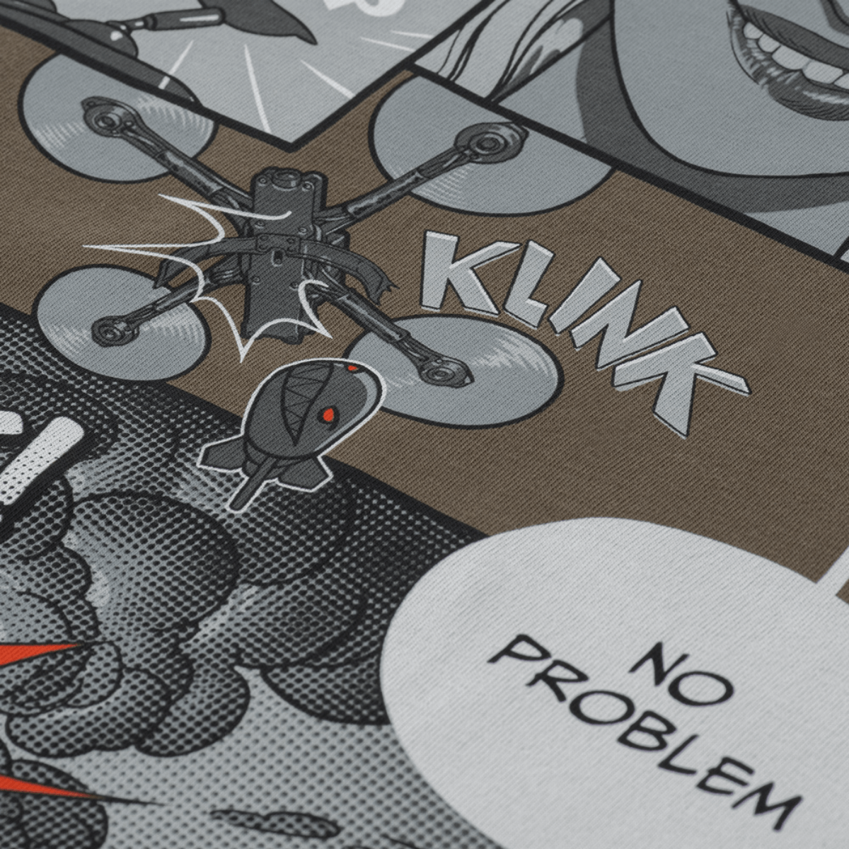 M-Tac T-Shirt Comics Drone Girl FPV-pilotti ja drone sarjakuvatyylissä, symboloi voimaa ja tarkkuutta taistelukentällä.