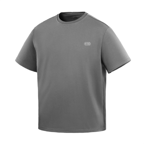 M-Tac Cotton HARD T-paita harmaana, suunniteltu arkeen oversize-leikkauksella ja heijastavalla logolla, valmistettu 100% puuvillasta.