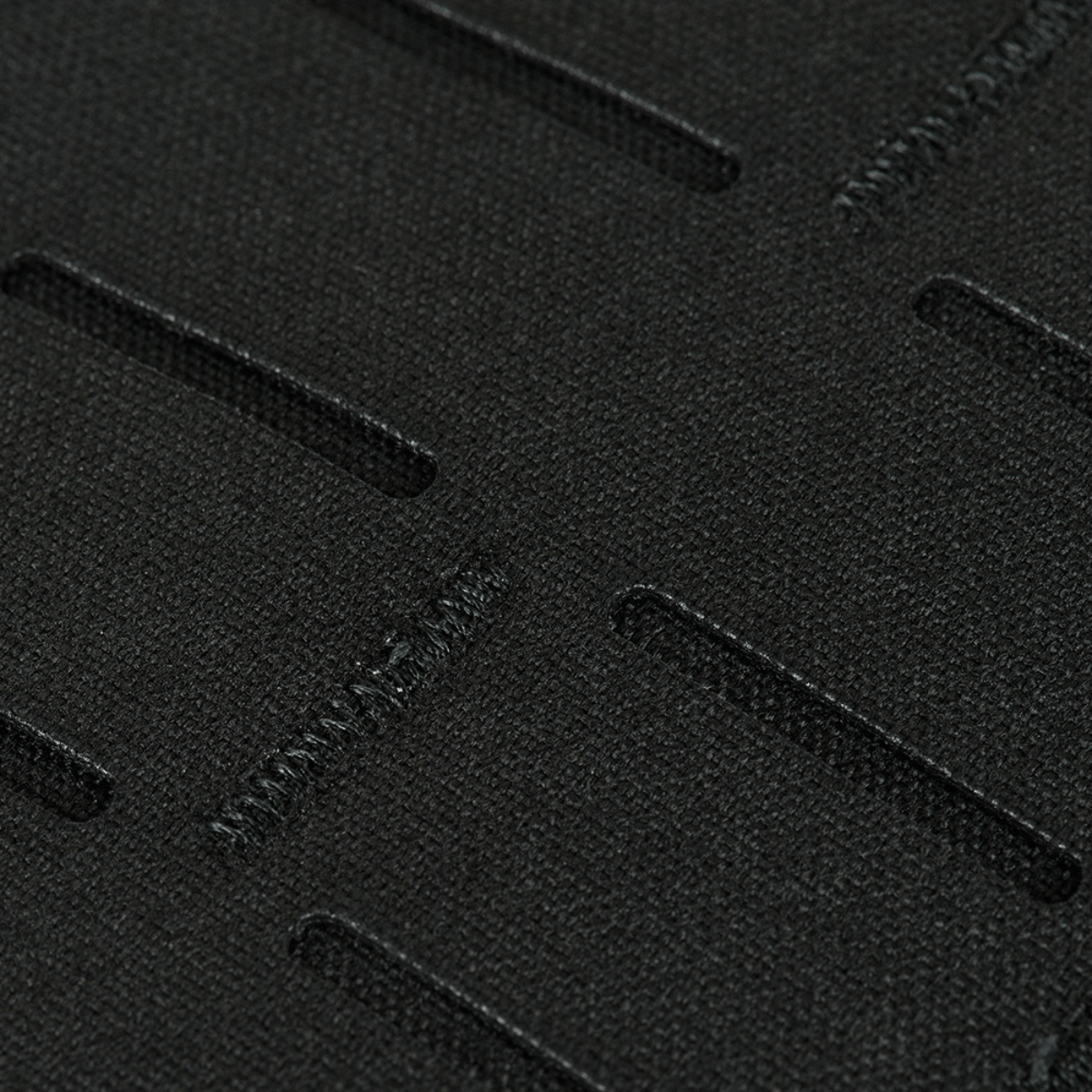 Lähikuva M-Tac Plate Carrier Cuirass FAST QRS Gen.II -materiaalista, Cordura 500D.