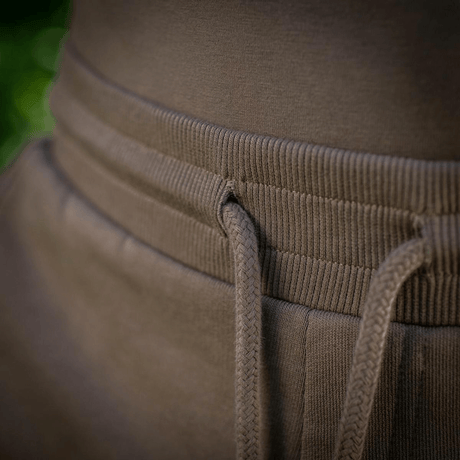 Lähikuva elastisesta vyötäröstä M-Tac Shorts Sport Fit Cottonissa, sopii urheiluun ja arkeen, valmistettu hengittävästä puuvillasta.