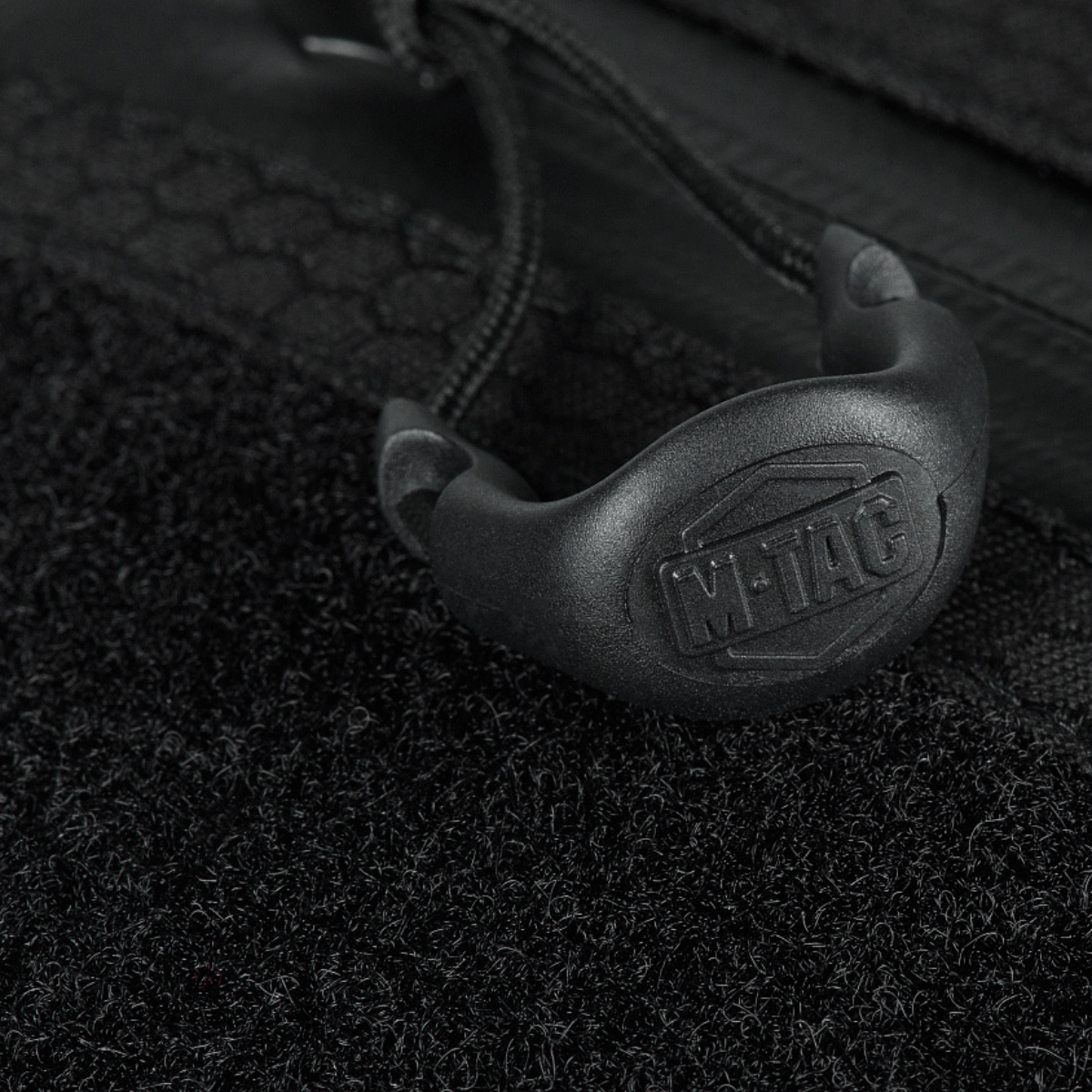 Yksityiskohta M-Tac Sling -pistoolilaukku Elite Hex Velcro, lähikuva vetoketjusta.