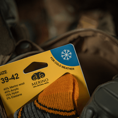 M-Tac Sukat Polar Merino 40% pakkauksessa, suunniteltu kylmiin ulko-olosuhteisiin, merinovillaa lämpöön ja mukavuuteen.