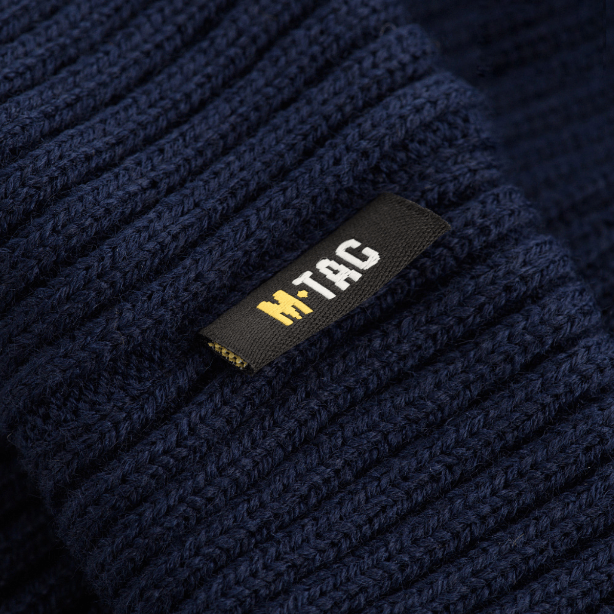 M-Tac Watch Cap 100% Akryl, tummansininen neulospipo jossa M-Tac-logo, sopii viileään säähän, valmistettu teollisella kaksoisneuloksella akryylistä.