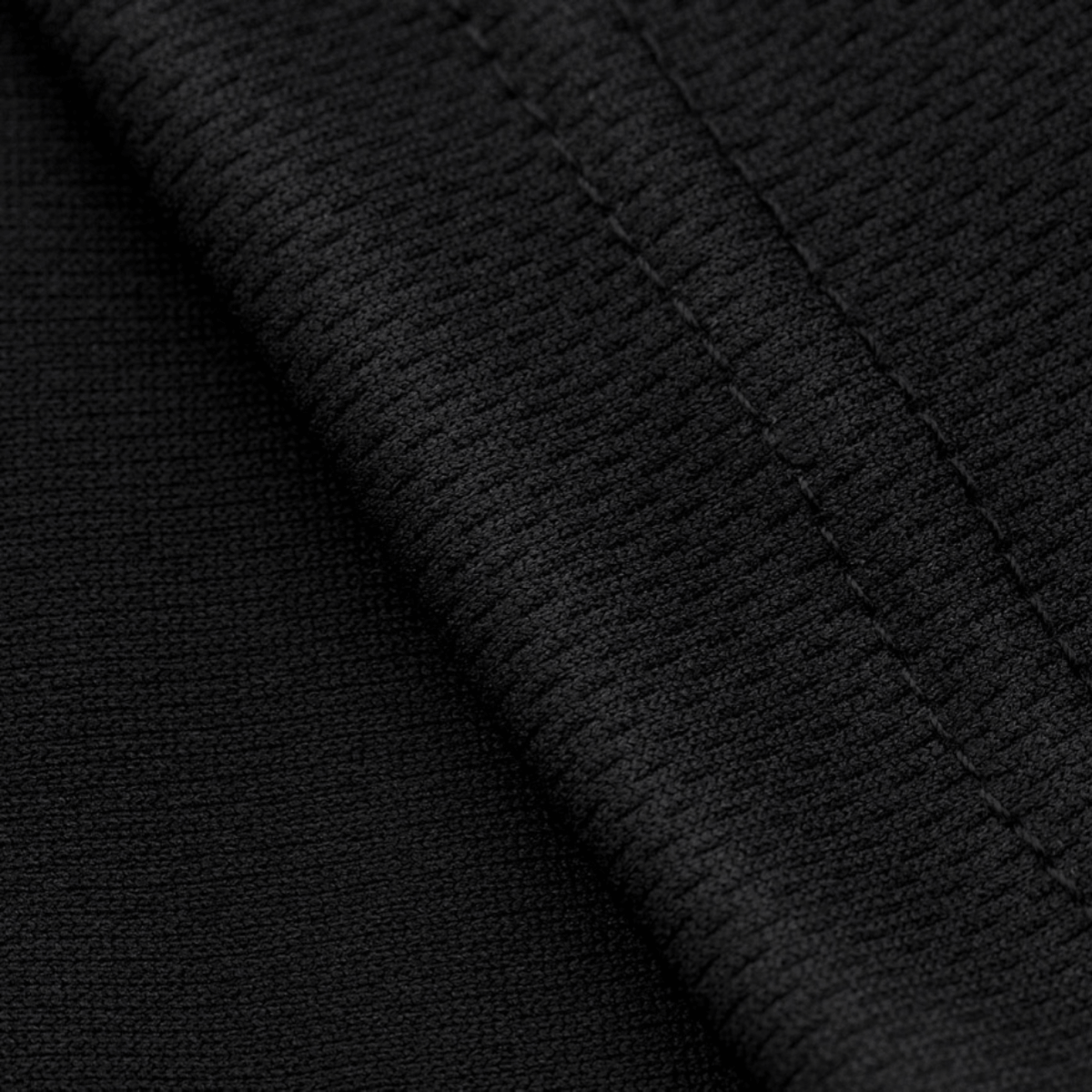 Yksityiskohta M-Tac Sweating Ninja-Balaclavan kankaan rakenteesta, 100% polyester, kosteutta siirtävä rakenne