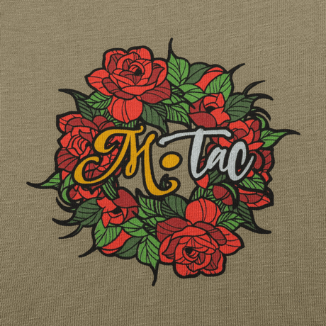 M-Tac T-Shirt Motanka värikkäällä kukkakuviolla rinnassa, korostaa M-Tac-logoa ja ukrainalaista kulttuuriperintöä.