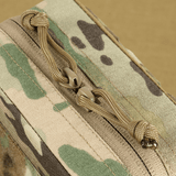 M-Tac Utility Pouch Elite Small Cordura 500D:stä, maastokuvio ja kestävät vetoketjut lähikuvassa.