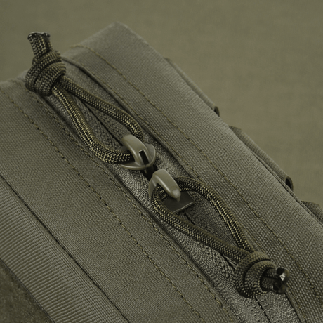Lähikuva M-Tac Utility Pouch Elite Smallista vahvalla vetoketjulla ja Cordura 500D -materiaalilla.