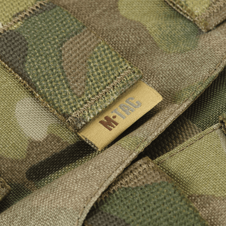 Yksityiskohta M-Tac War Belt ARMORista MOLLE-webbingillä, näyttää Cordura 500D:n maastokuvioinnissa.