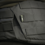 Yksityiskohta M-Tac War Belt ARMORista kestävässä Cordura 500D:ssä ja MOLLE-webbingillä taktiseen käyttöön.