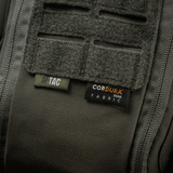 M-Tac Medical Pouch Elite Rip Off CORDURA-kankaalla, lähikuva saumoista ja logosta