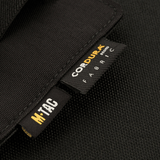 M-Tac Double Mag Pouch Hook Backed Magazine valmistettu kulutusta kestävästä CORDURA-kankaasta, varustettu merkinnöillä, modulaariseen säilytykseen