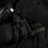 M-Tac Elastisk Tourniquet Pouch Molle Gen.III kiinnitetty taktiseen varusteeseen, valmistettu Cordura Squadron -materiaalista.