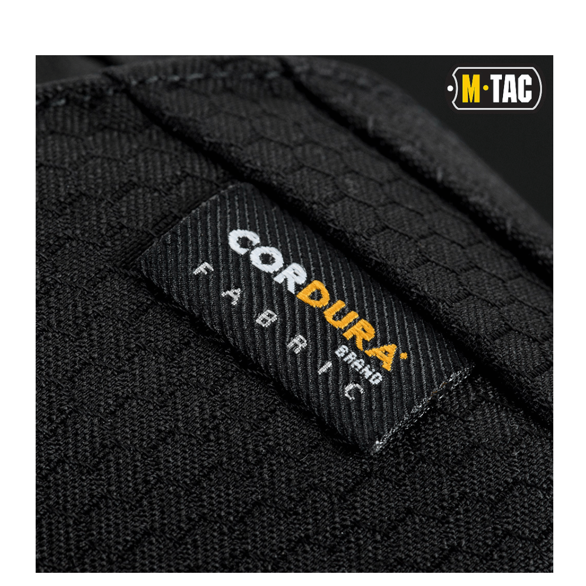 Lähikuva M-Tac Magnet XL Taske Elite Hexistä, Cordura-kankaan yksityiskohdat ja M-TAC-logo.