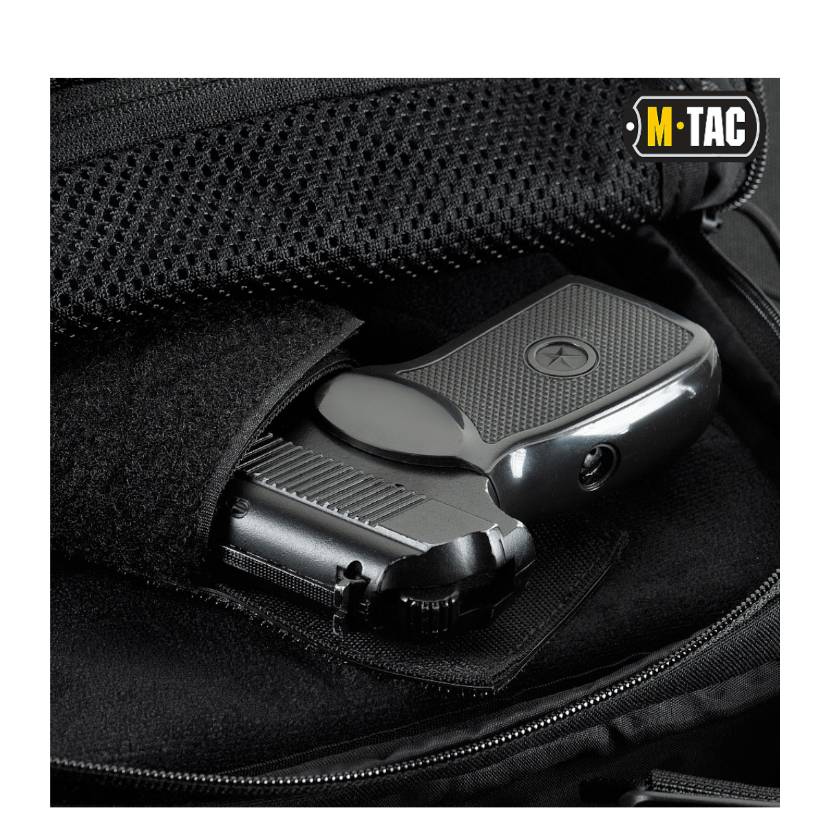 M-Tac Magnet XL Taske Elite Hex universaalihölsterillä ja FidLock-lukitusjärjestelmällä.