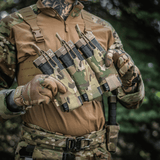 M‑Tac Elastinen Single Magazine Pouch Elite osoittaa useiden lippaiden kapasiteetin taktillisessa ympäristössä, MOLLE-yhteensopiva