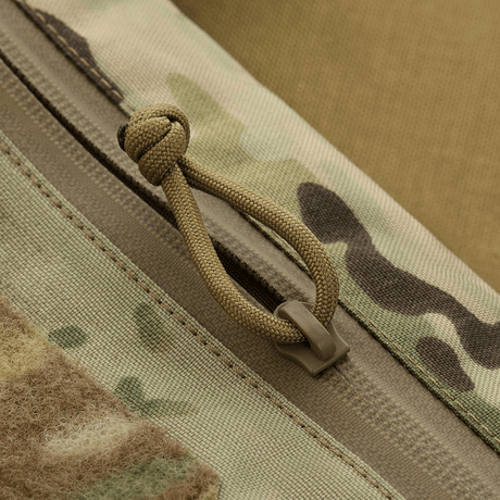 Yksityiskohta M-Tac taktinen käsilämmitin Elite kestävä Cordura ja mesh-takapuoli lisämukavuuteen ja tuuletukseen.