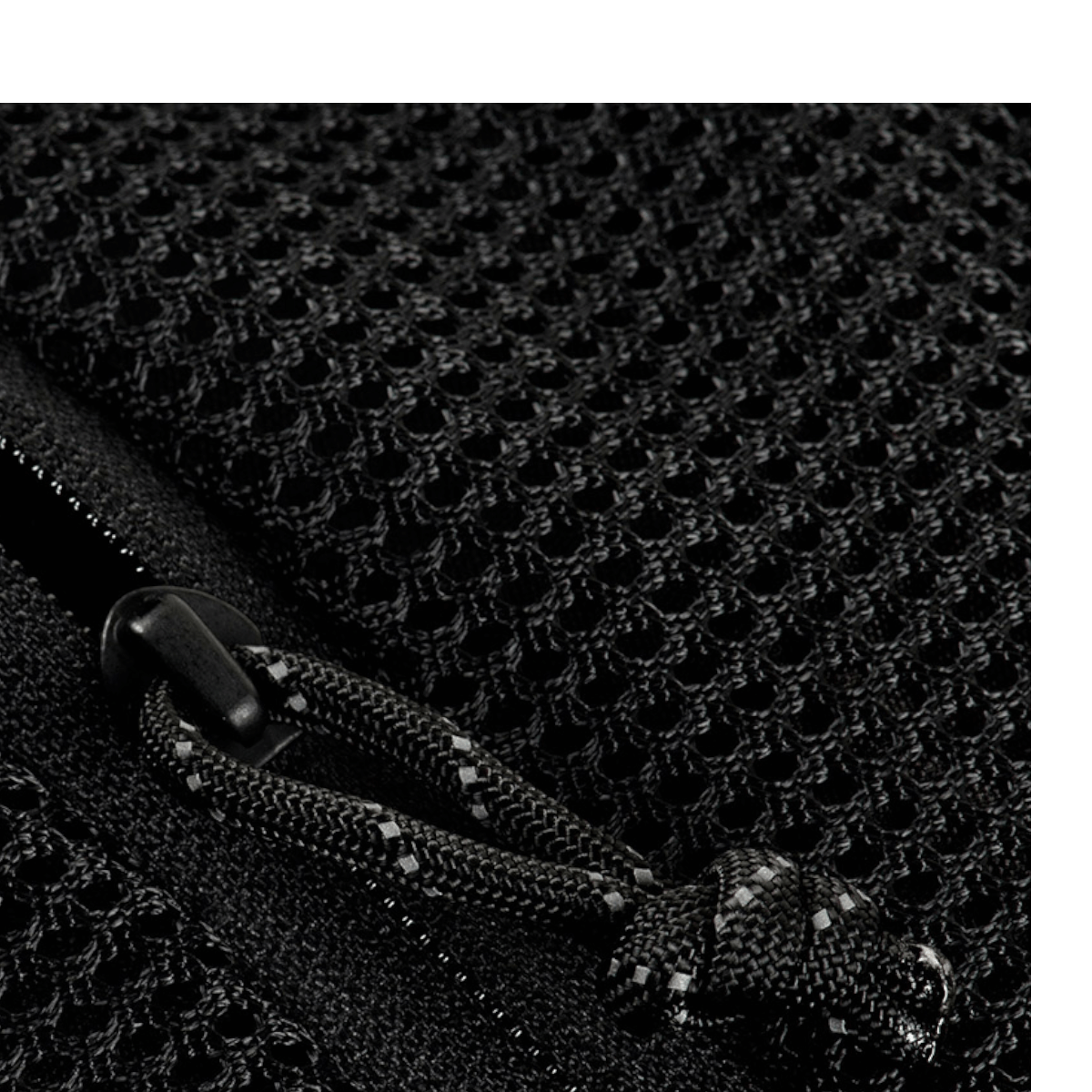 Lähikuva M-Tac Sling Pistoltaske Elite Hexistä, Cordura-kangas ja YKK-vedoketjut.